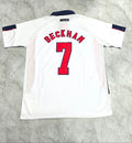 White sports jersey with 'Beckham' and number '7' on a gray textured background